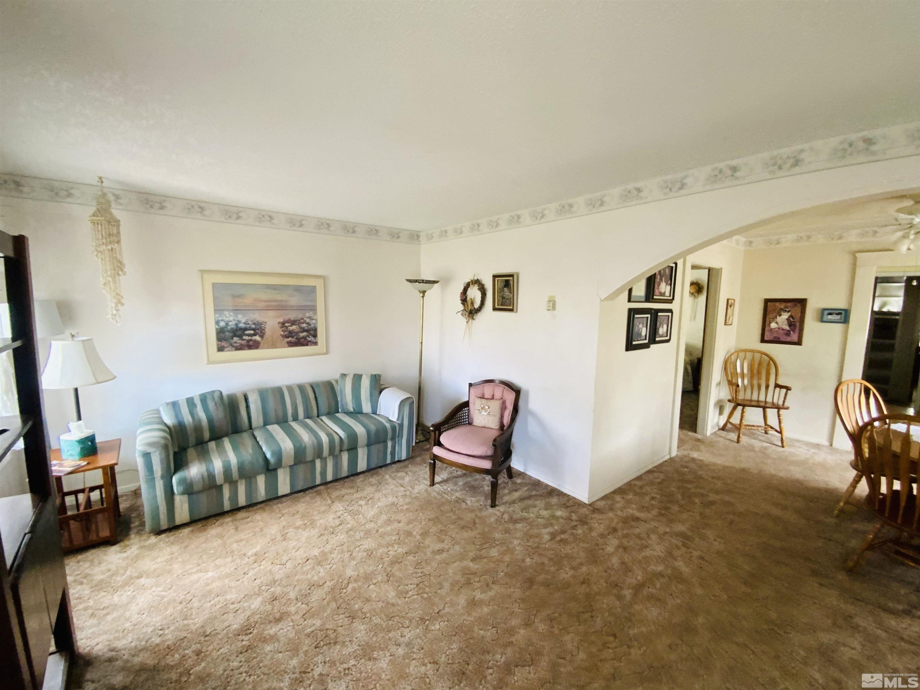 200 McLean Road Fallon, NV 89406 - Photo 7 of 16 a living room with furniture and a flat screen tv