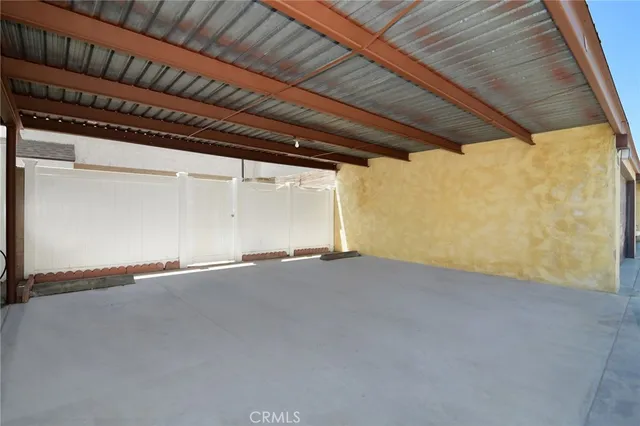 a view of empty room with windows