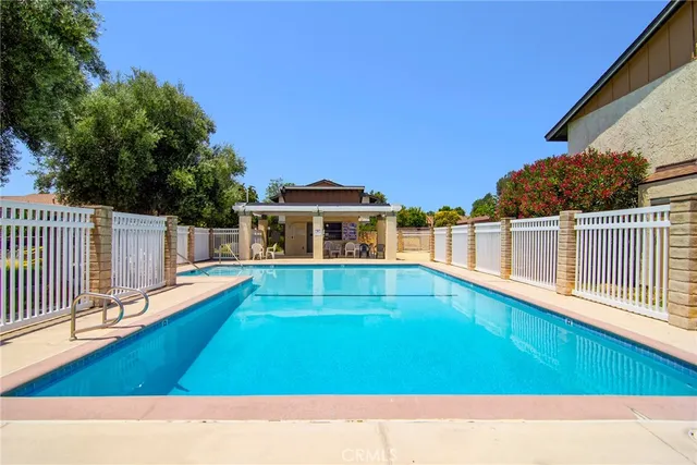 a view of an outdoor space with swimming pool