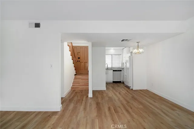 a view of a kitchen from the hallway