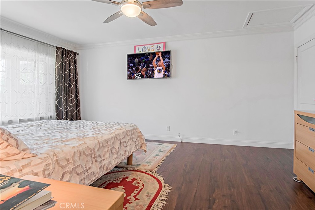 3025 Halsey Avenue Arcadia, CA 91006 - Photo 16 of 42 a bedroom with a bed and a chandelier