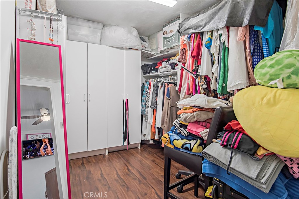 3025 Halsey Avenue Arcadia, CA 91006 - Photo 17 of 42 a view of walk in closet with clothes and shoes