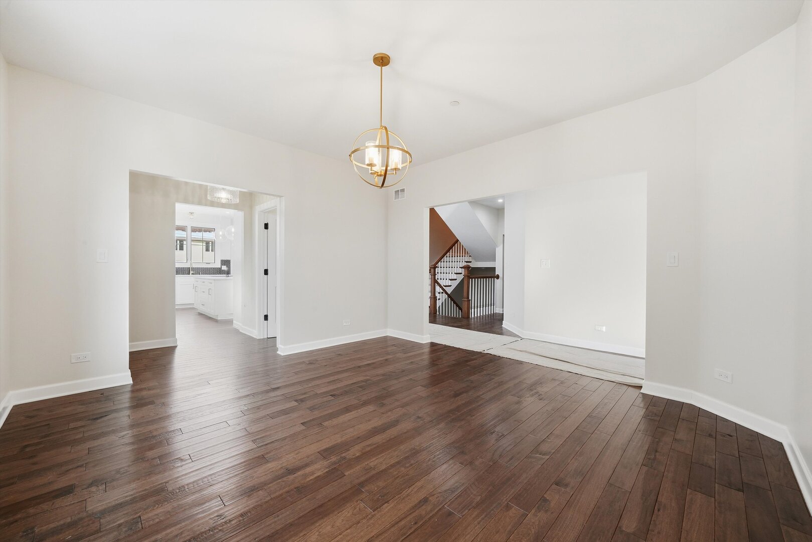 926 East Crest Avenue Addison, IL 60101 - Photo 15 of 34 a view of empty room with wooden floor and window