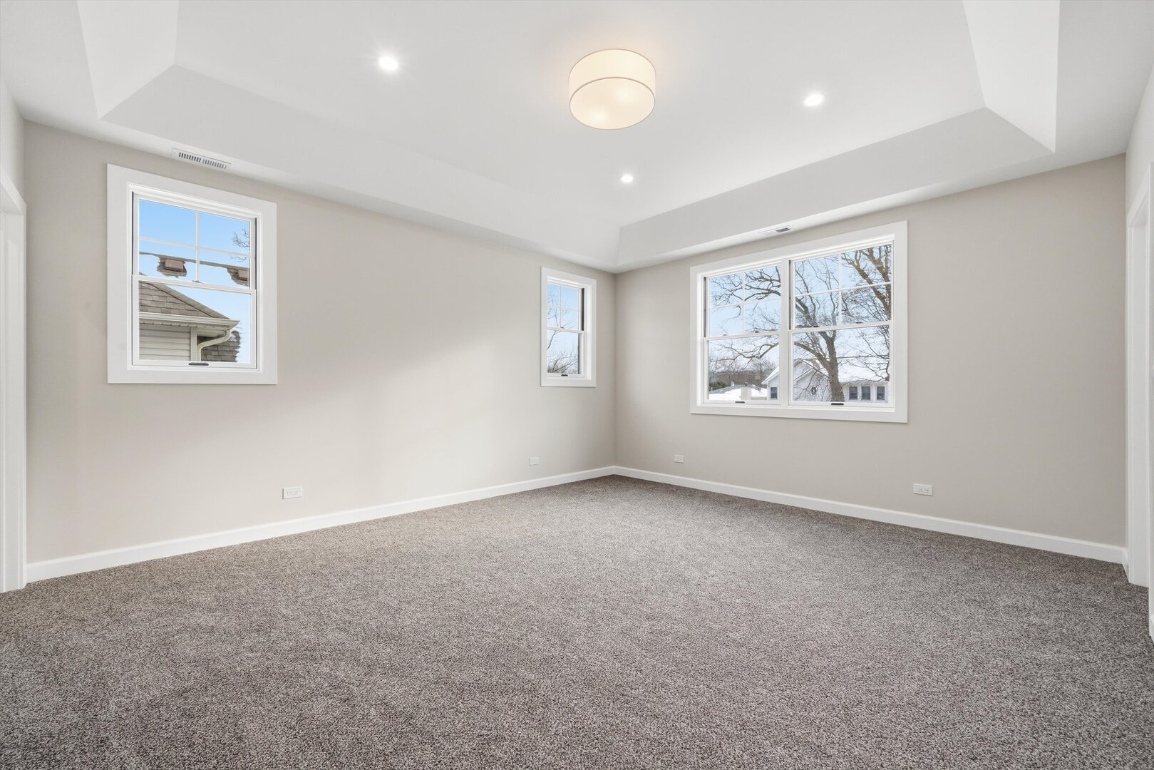 926 East Crest Avenue Addison, IL 60101 - Photo 24 of 34 a view of an empty room with a painting on the wall
