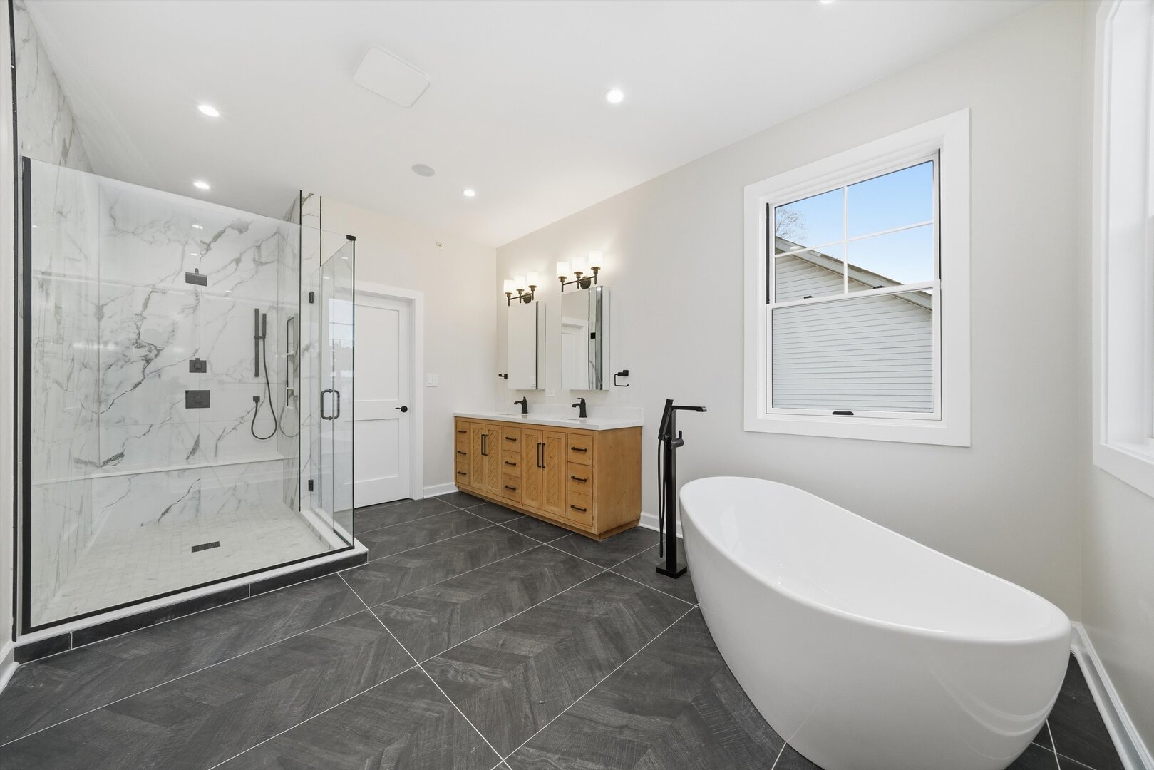 926 East Crest Avenue Addison, IL 60101 - Photo 31 of 34 a bathroom with a bathtub and a shower
