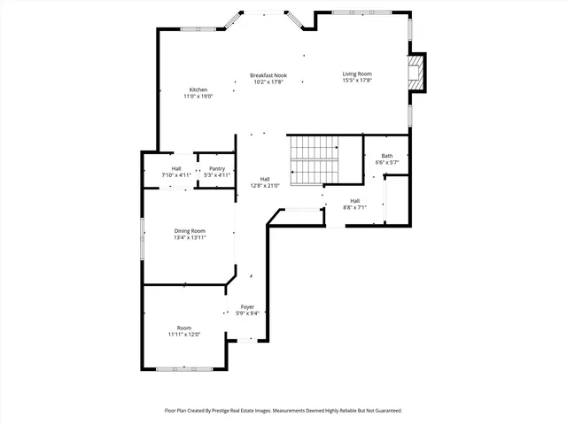 a picture of a bench in front of a gate