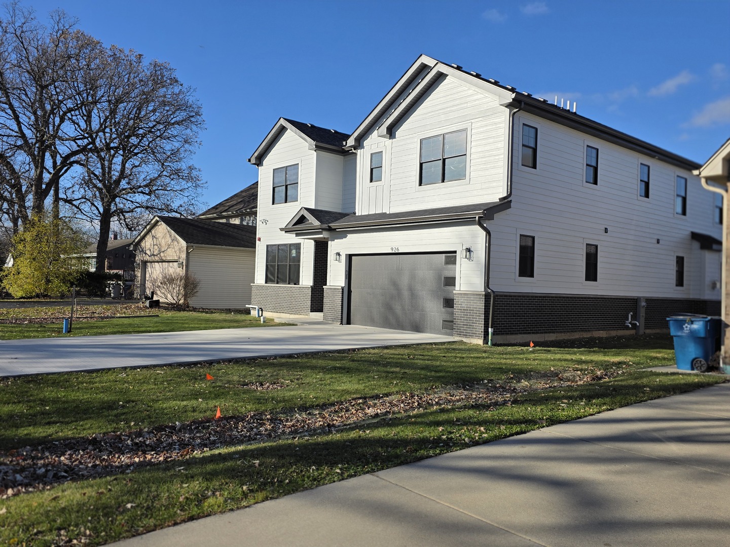 926 East Crest Avenue Addison, IL 60101 - Photo 4 of 34 a front view of a house with a yard