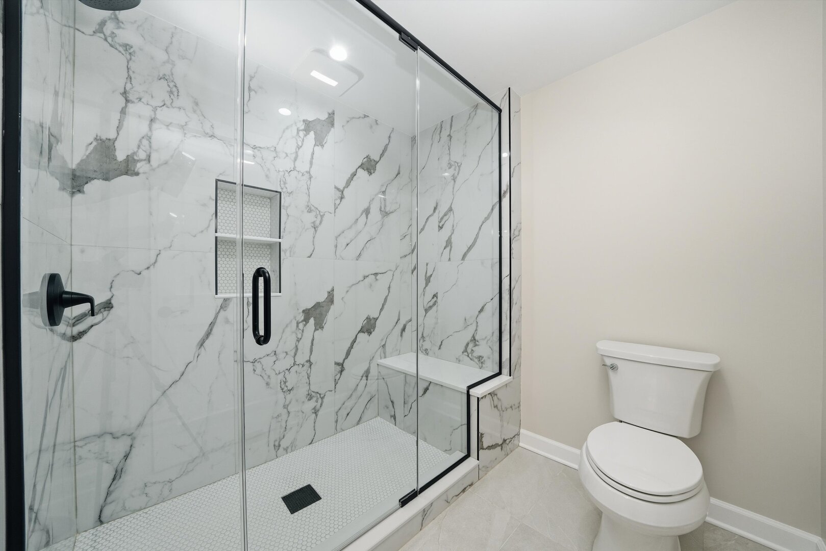 926 East Crest Avenue Addison, IL 60101 - Photo 7 of 34 a bathroom with a shower toilet and sink