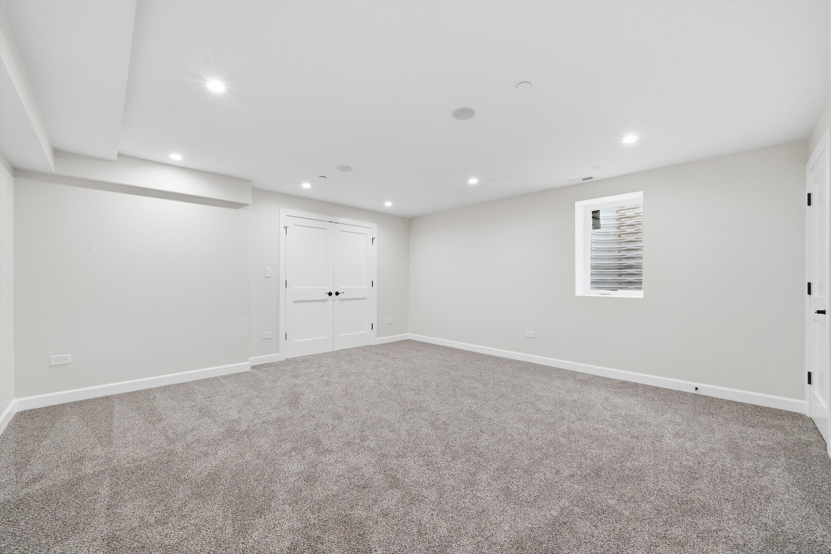 926 East Crest Avenue Addison, IL 60101 - Photo 8 of 34 an empty room with a empty space and windows