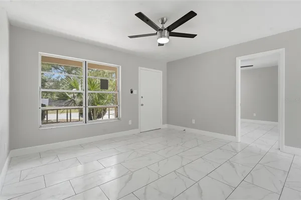 a kitchen with a sink stove and refrigerator