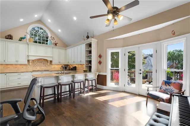 a view of a dining room with furniture window and outside view