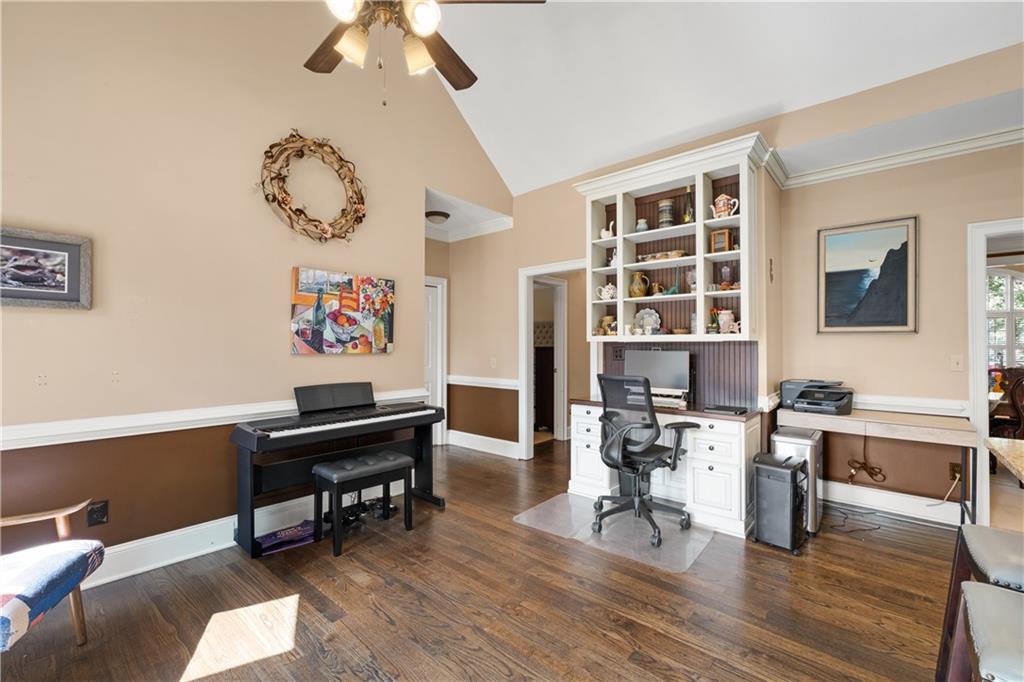 3613 Greystone Circle Chamblee, GA 30341 - Photo 15 of 53 a view of a workspace with furniture and wooden floor
