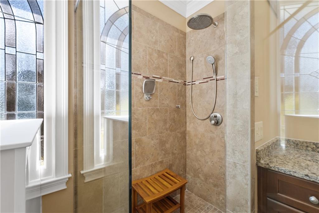 3613 Greystone Circle Chamblee, GA 30341 - Photo 28 of 53 a bathroom with a granite countertop shower and a sink