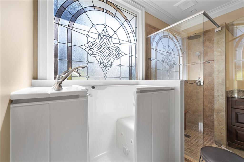 3613 Greystone Circle Chamblee, GA 30341 - Photo 29 of 53 a bathroom with a sink and a mirror