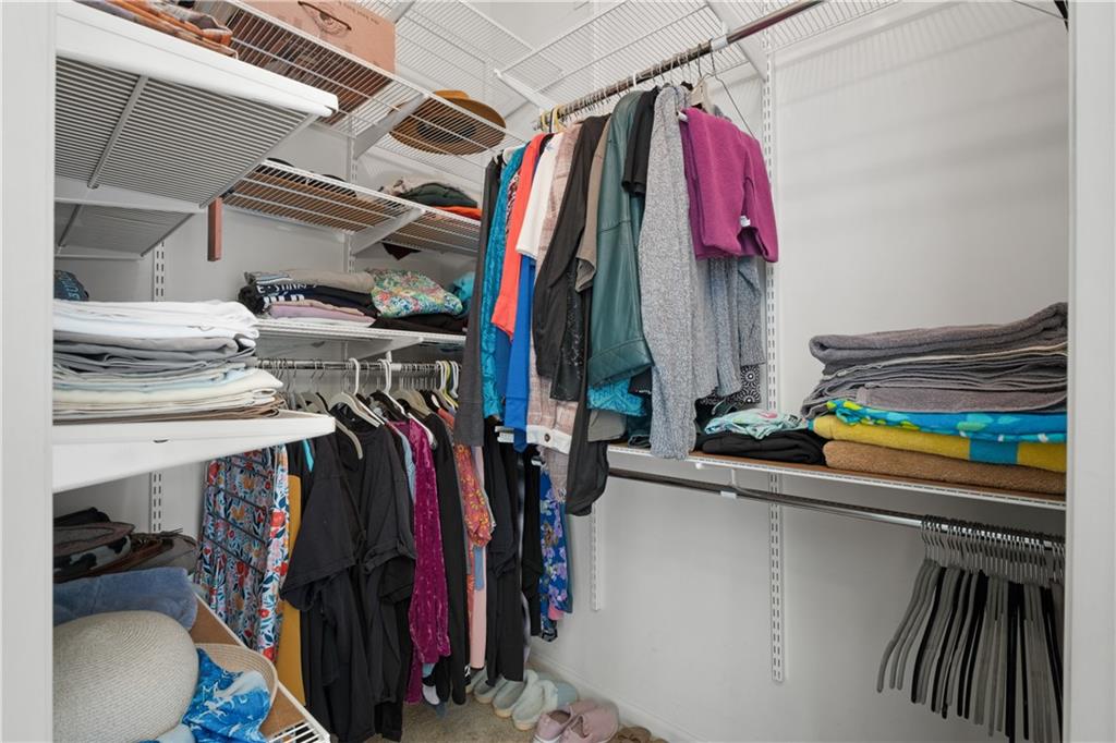 3613 Greystone Circle Chamblee, GA 30341 - Photo 30 of 53 a view of walk in closet with clothes and shoes