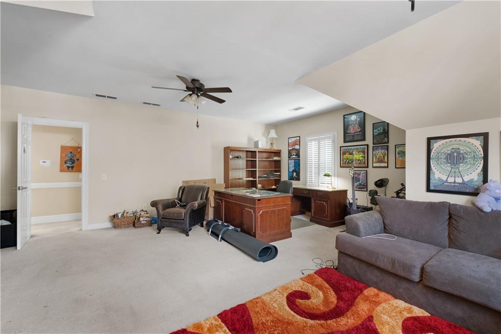 3613 Greystone Circle Chamblee, GA 30341 - Photo 39 of 53 a living room with furniture and a table