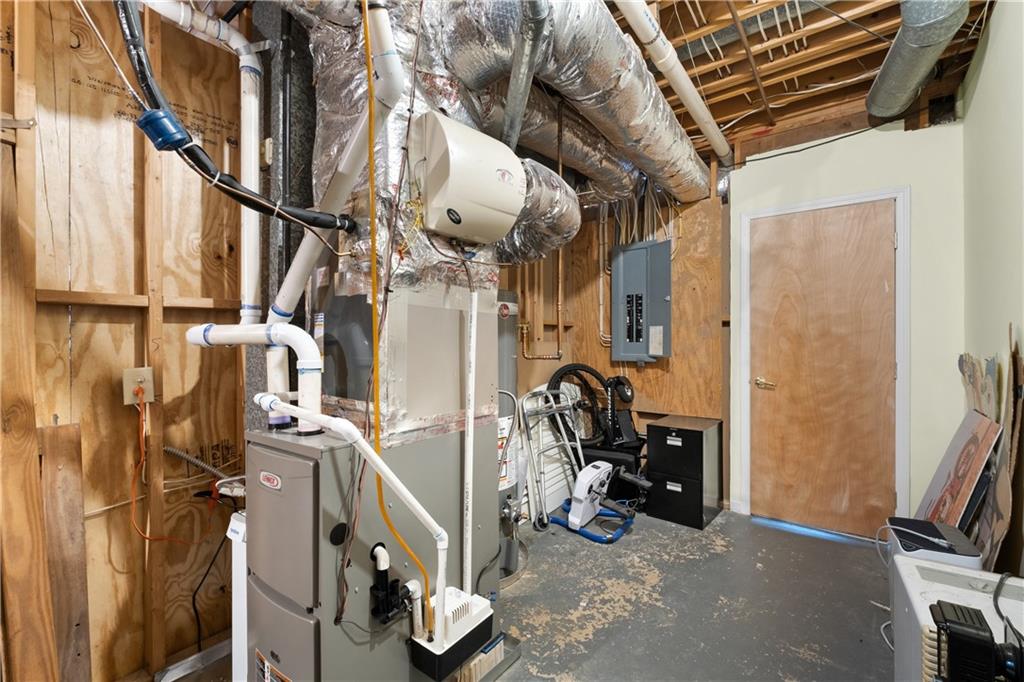 3613 Greystone Circle Chamblee, GA 30341 - Photo 40 of 53 a view of walk in closet with clothes and shoes