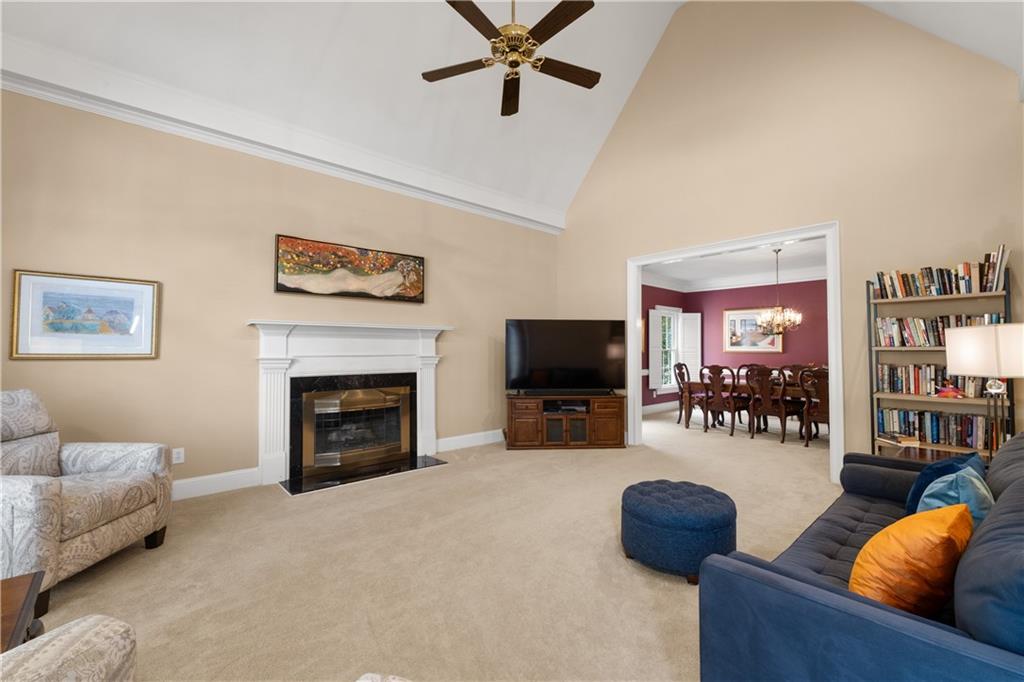 3613 Greystone Circle Chamblee, GA 30341 - Photo 8 of 53 a living room with furniture and a fireplace