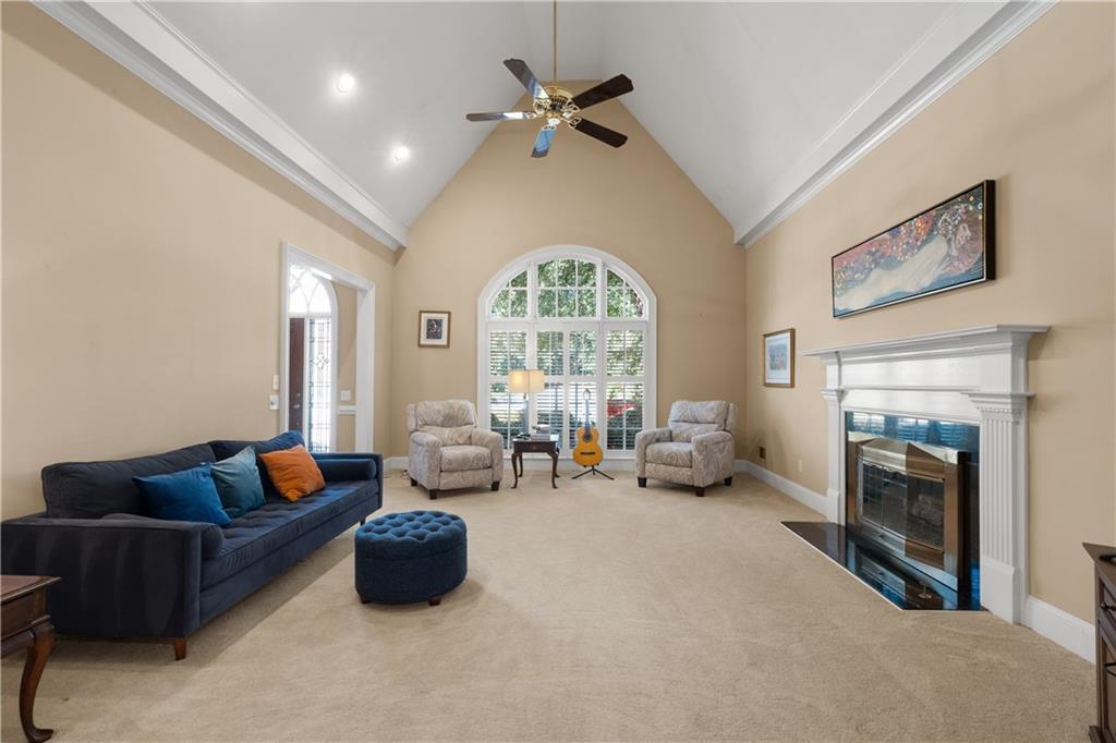 3613 Greystone Circle Chamblee, GA 30341 - Photo 10 of 53 a living room with furniture and a fireplace