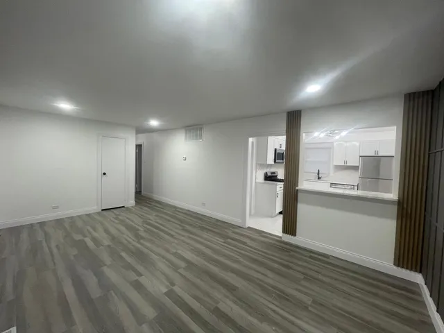 a view of an empty room and window