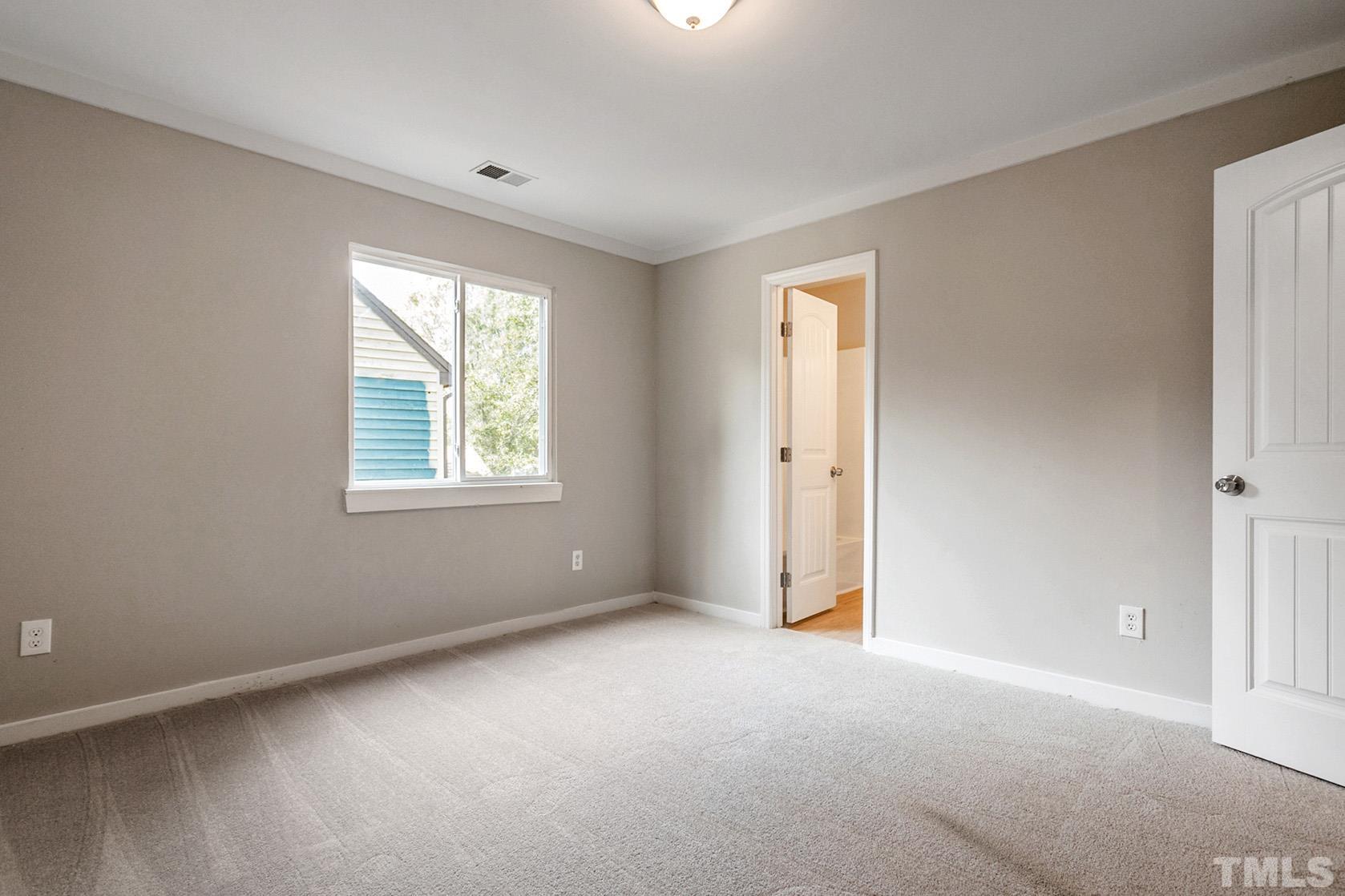 1904 Carthage Circle Raleigh, NC 27604 - Photo 13 of 25 an empty room with windows