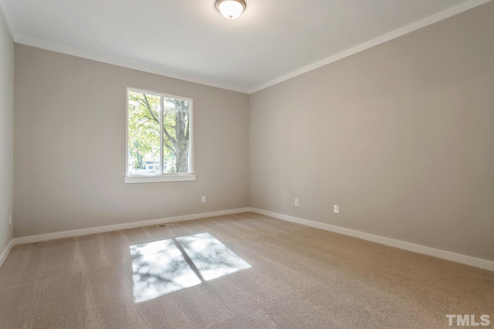 1904 Carthage Circle Raleigh, NC 27604 - Photo 16 of 25 an empty room with a window
