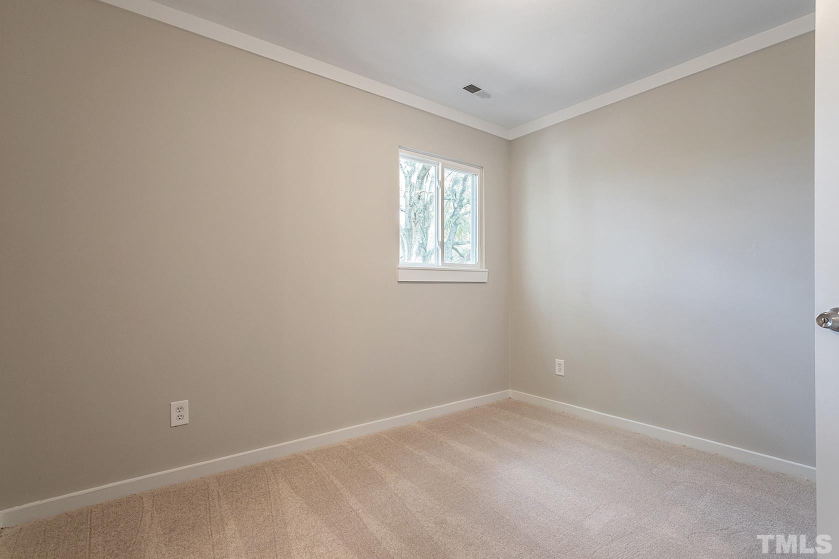 1904 Carthage Circle Raleigh, NC 27604 - Photo 18 of 25 an empty room with a window