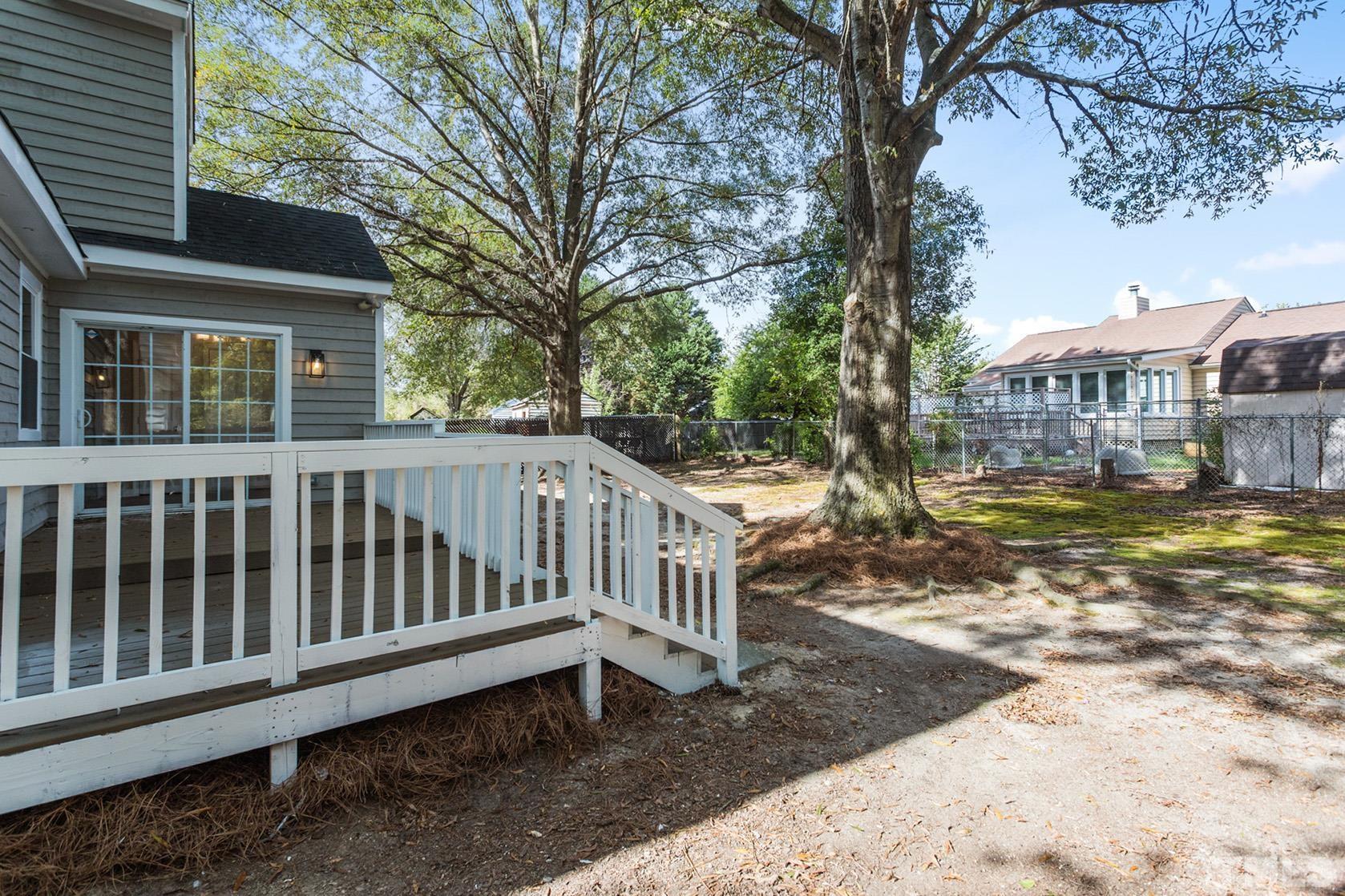 1904 Carthage Circle Raleigh, NC 27604 - Photo 22 of 25 a view of a house with a yard in the back