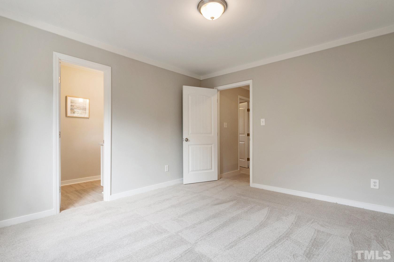 1904 Carthage Circle Raleigh, NC 27604 - Photo 5 of 25 a view of an empty room and window