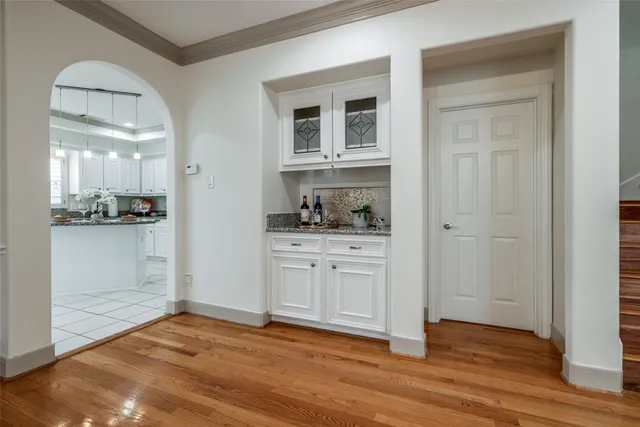 a view of a kitchen from the hallway