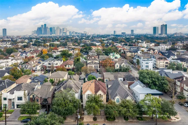 an aerial view of a city with lots of residential buildings