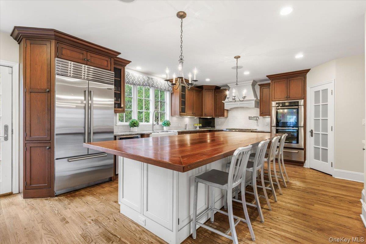 30 Lindbergh Avenue Rye, NY 10580 - Photo 11 of 36 The kitchen features high end appliances including Subzero and Wolf, as well as two dishwasher.