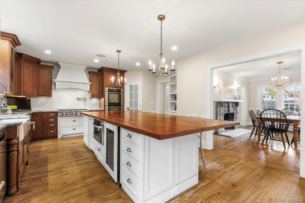 30 Lindbergh Avenue Rye, NY 10580 - Photo 12 of 36 The oversized island features a microwave and beverage fridge and allows for seating for at least 5.