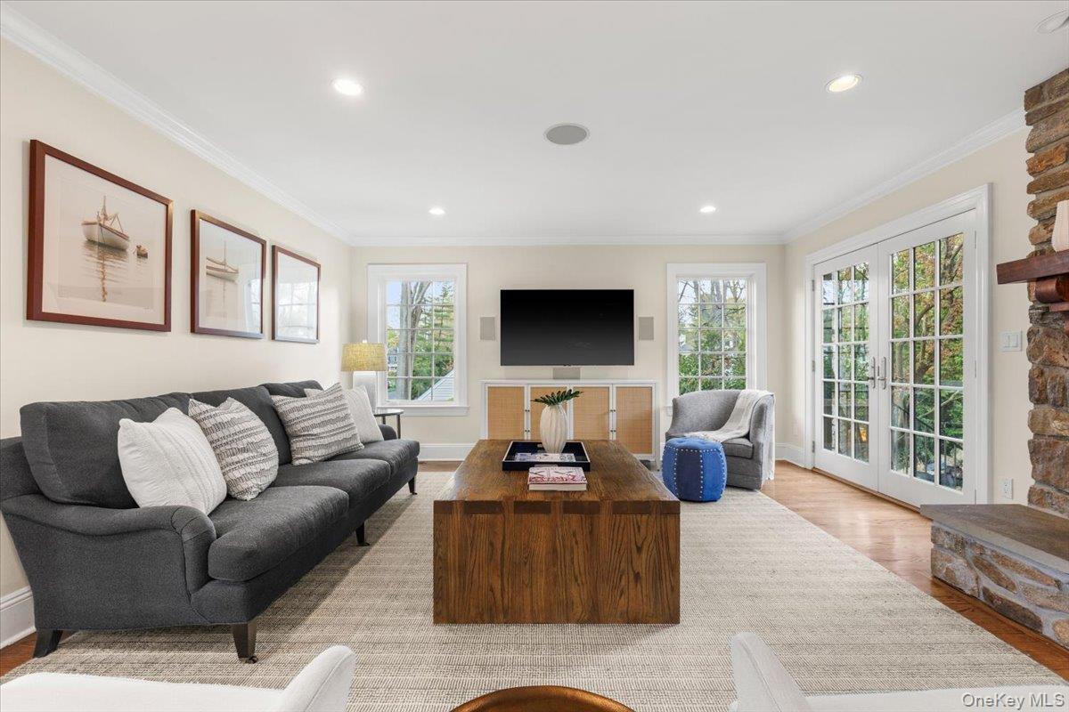 30 Lindbergh Avenue Rye, NY 10580 - Photo 6 of 36 The spacious living room is full of natural light due to beautiful french doors and large windows.