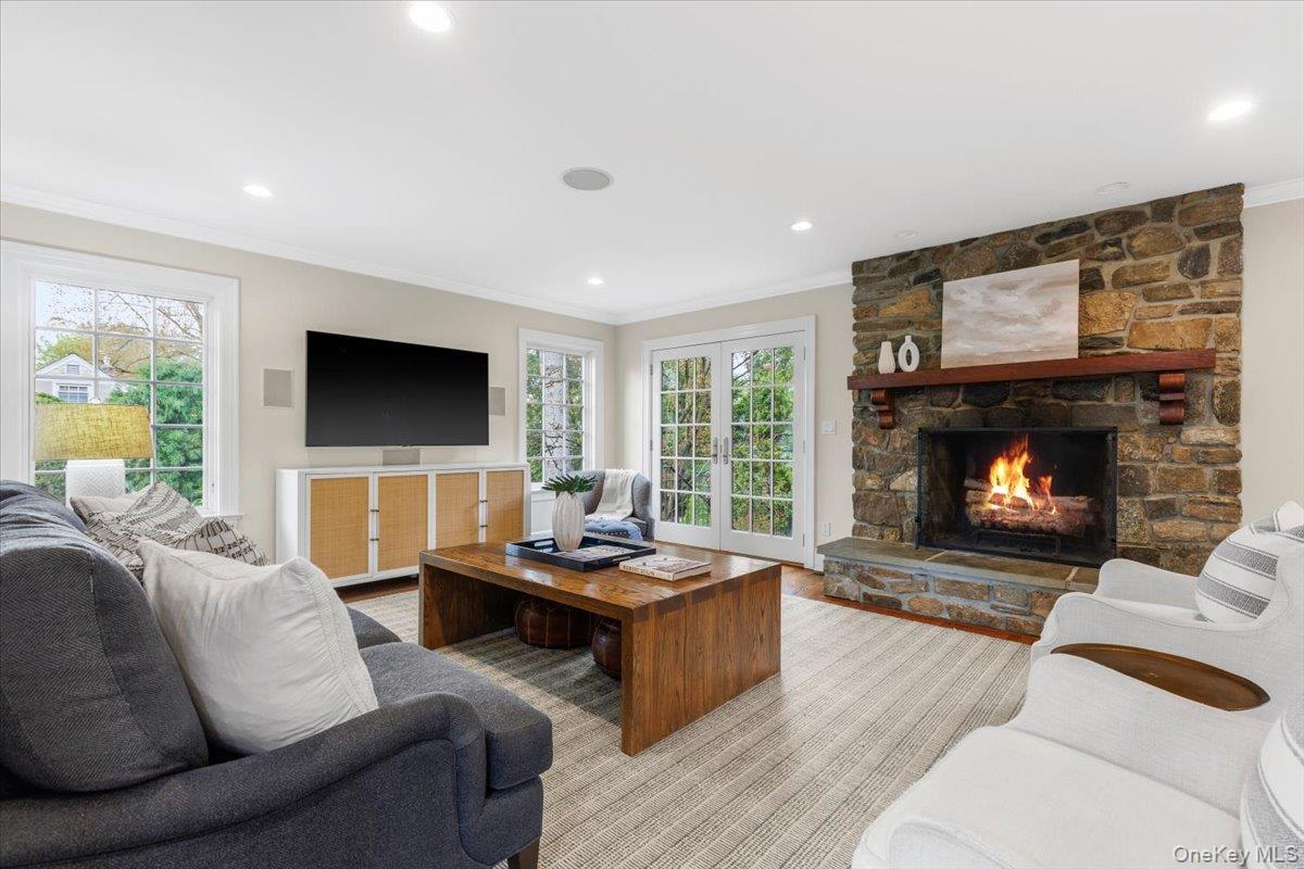 30 Lindbergh Avenue Rye, NY 10580 - Photo 7 of 36 The living room has a wood burning fireplace.