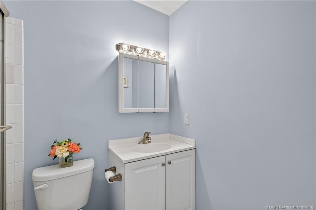 2929 Southeast Ocean Boulevard, Unit J3 Stuart, FL 34996 - Photo 29 of 65 a utility room with dryer and washer