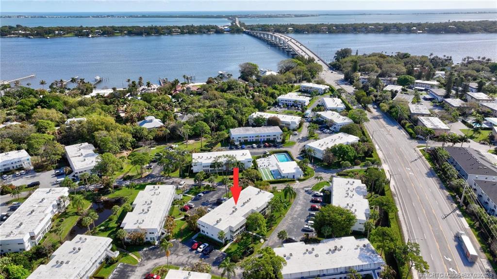 2929 Southeast Ocean Boulevard, Unit J3 Stuart, FL 34996 - Photo 54 of 65 an aerial view of a house with a lake view
