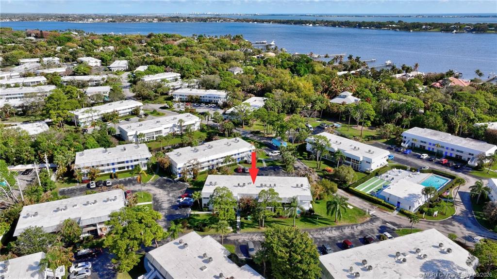 2929 Southeast Ocean Boulevard, Unit J3 Stuart, FL 34996 - Photo 57 of 65 an aerial view of a house with a lake view