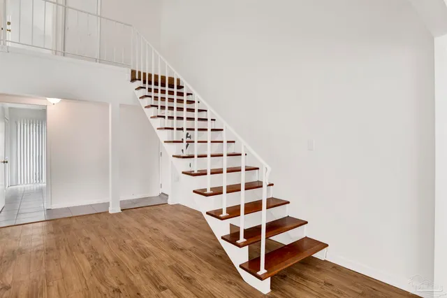 a view of a hallway with windows