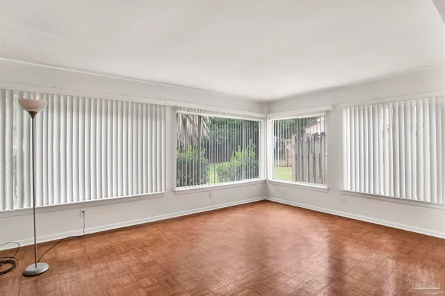 an empty room with windows