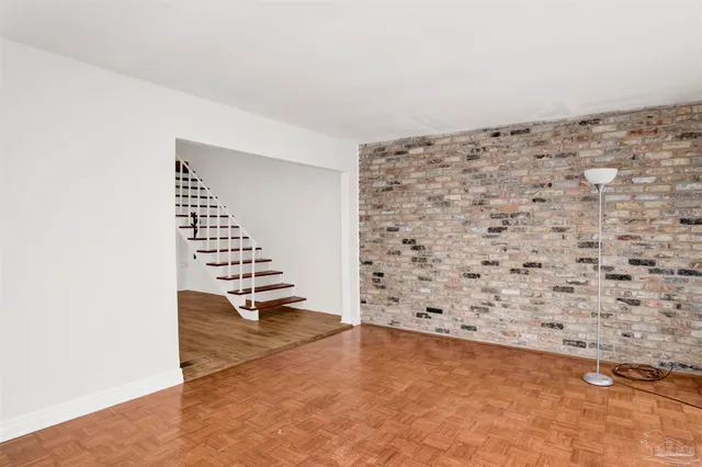 a kitchen with a refrigerator a sink and dishwasher
