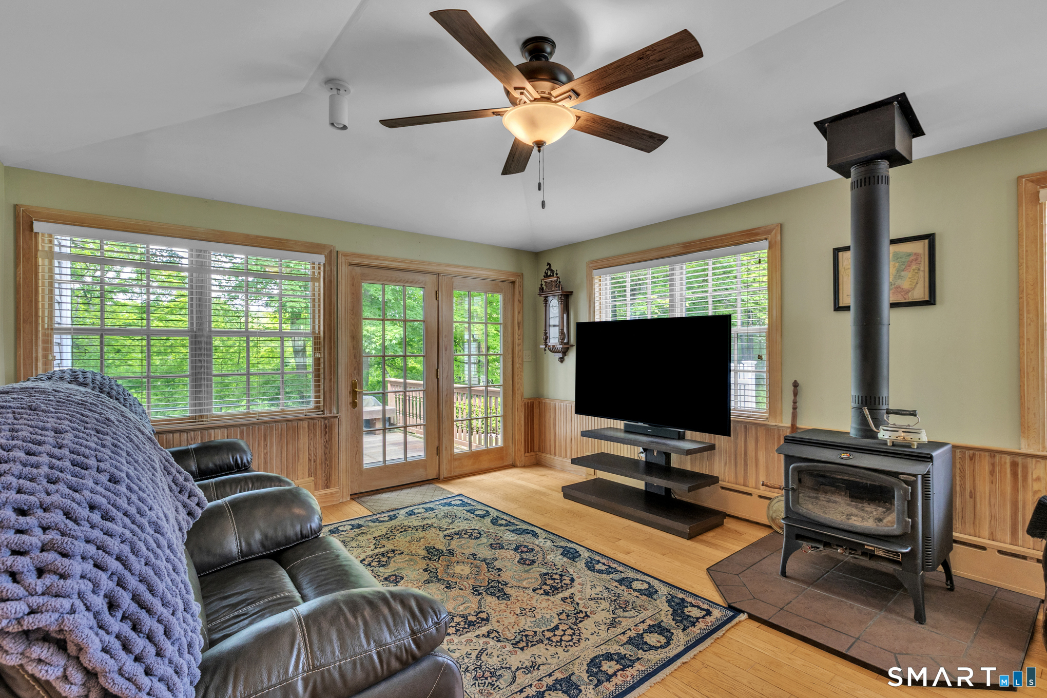808 Branch Road Suffield, CT 06078 - Photo 15 of 40 a living room with furniture and a flat screen tv