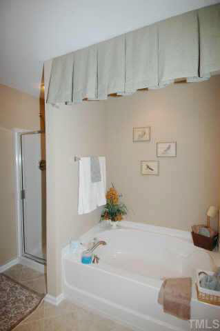 3147 Winding Waters Way Raleigh, NC 27614 - Photo 5 of 10 Model home with optional upgraded master bath fit for royalty Other