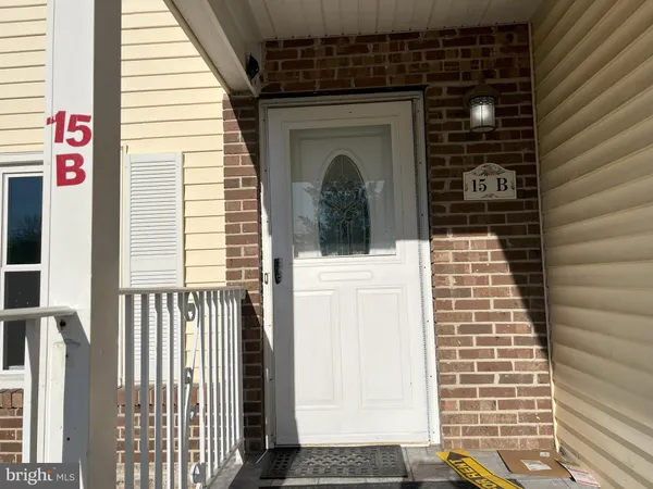 a view of a door and a window