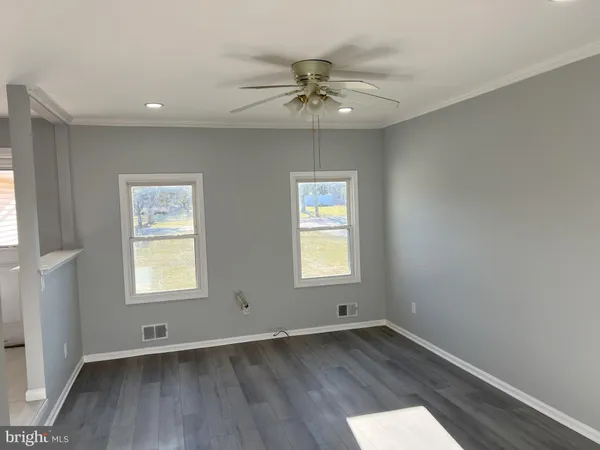 a bathroom with a toilet and a sink