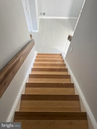 a bathroom with a sink and washing machine