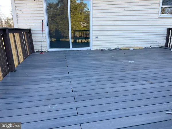 a view of front door and deck