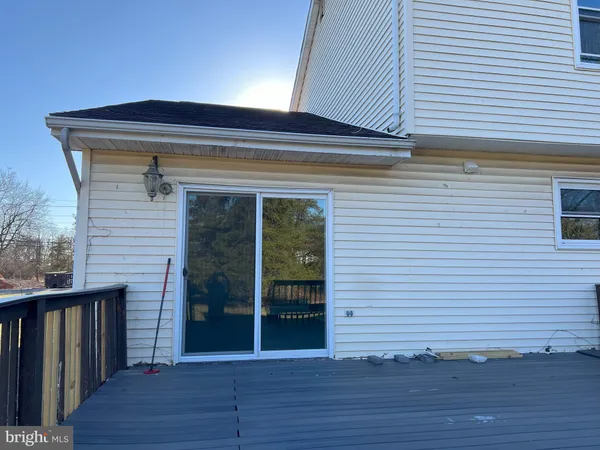 a front view of a house with glass windows