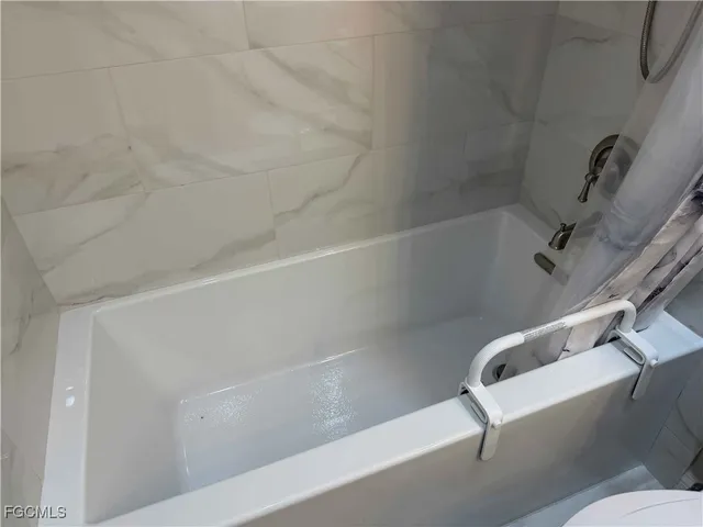 a bathroom with a bathtub