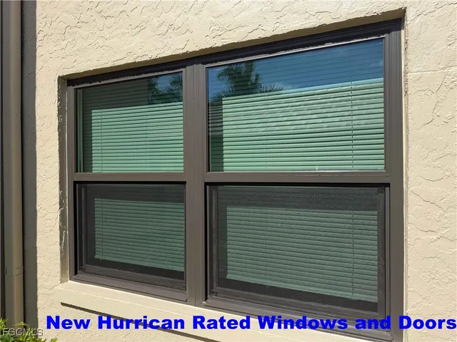 a small white building with a door